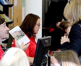 Student talking to guest